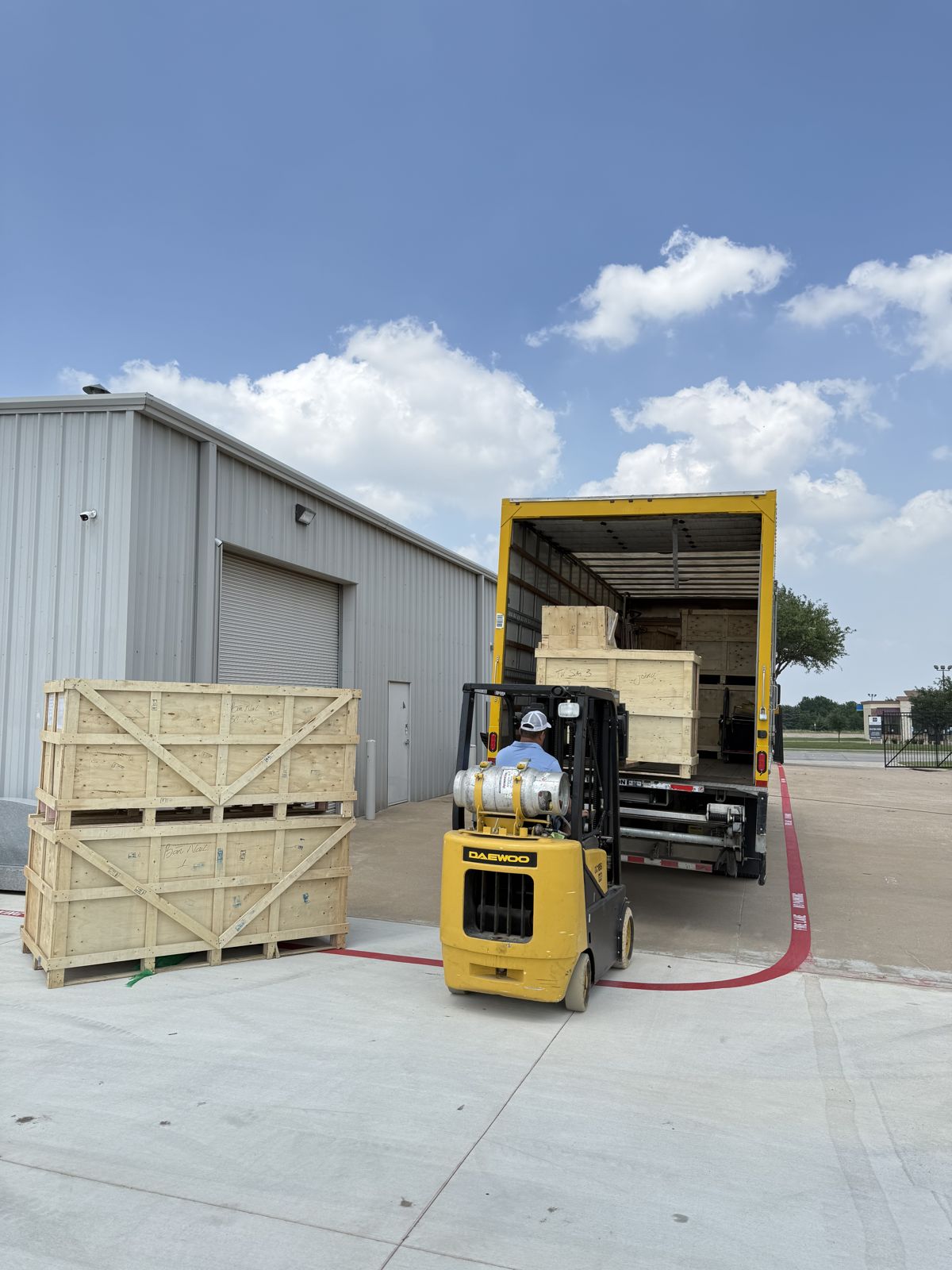 Labor-only moving crew loading and unloading furniture