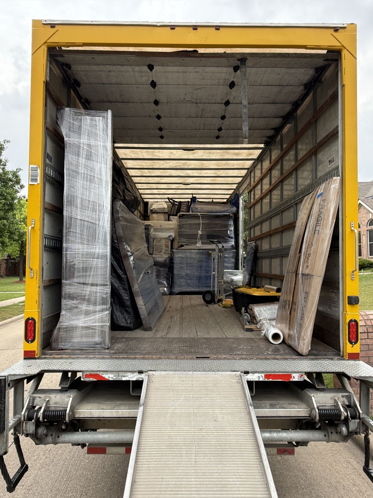 TL Moving crew loading a truck for a long distance move